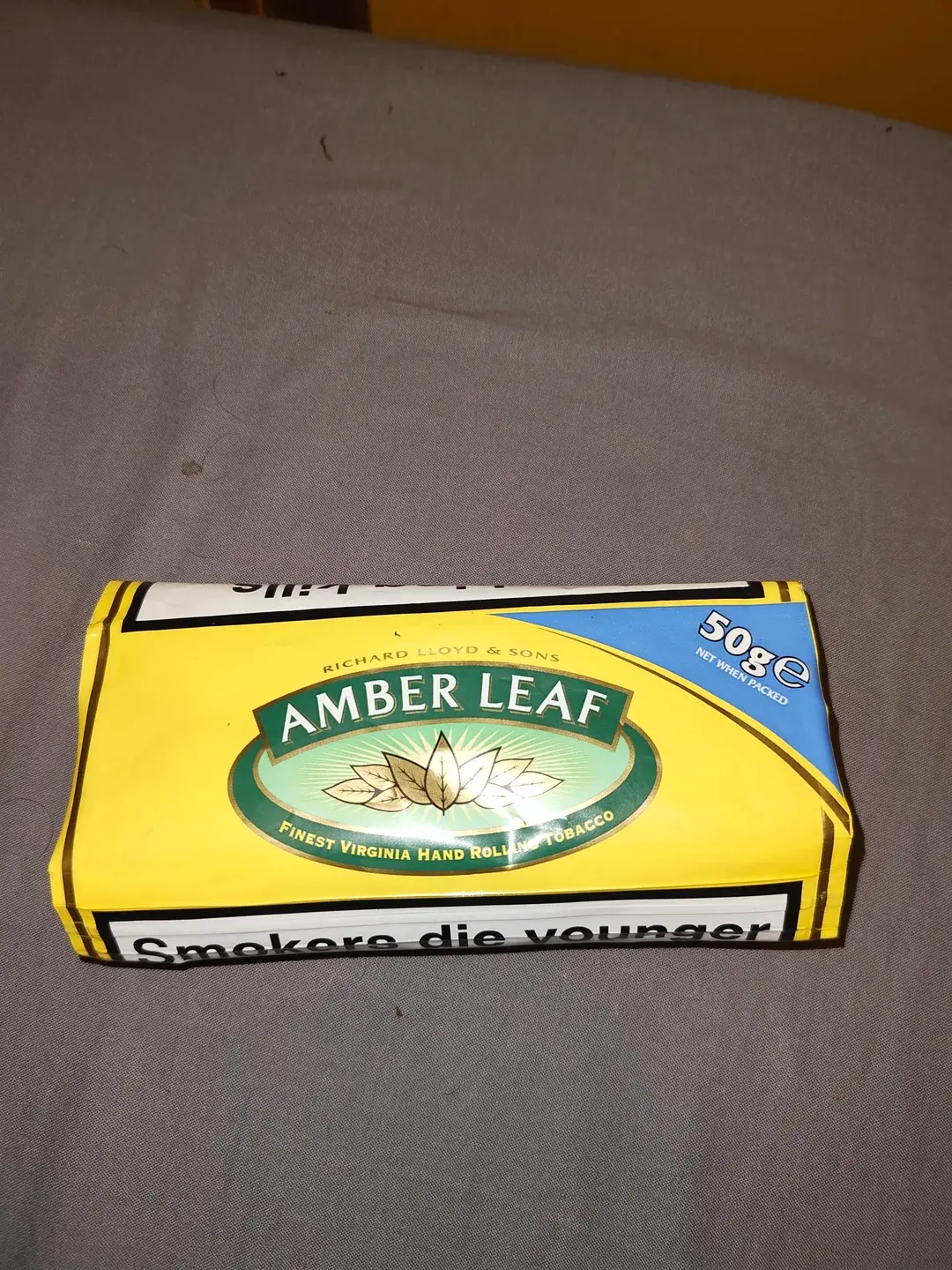 Opened pouch with fresh tobacco close-up