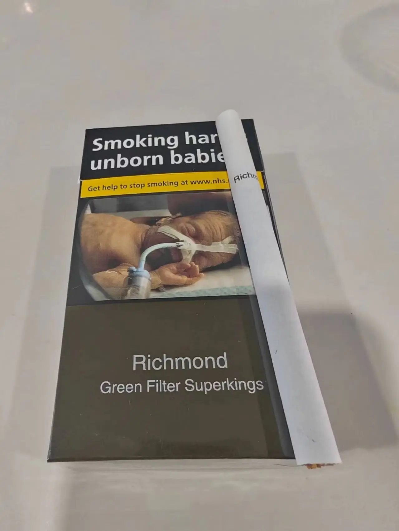 Three cartons unboxed on kitchen table