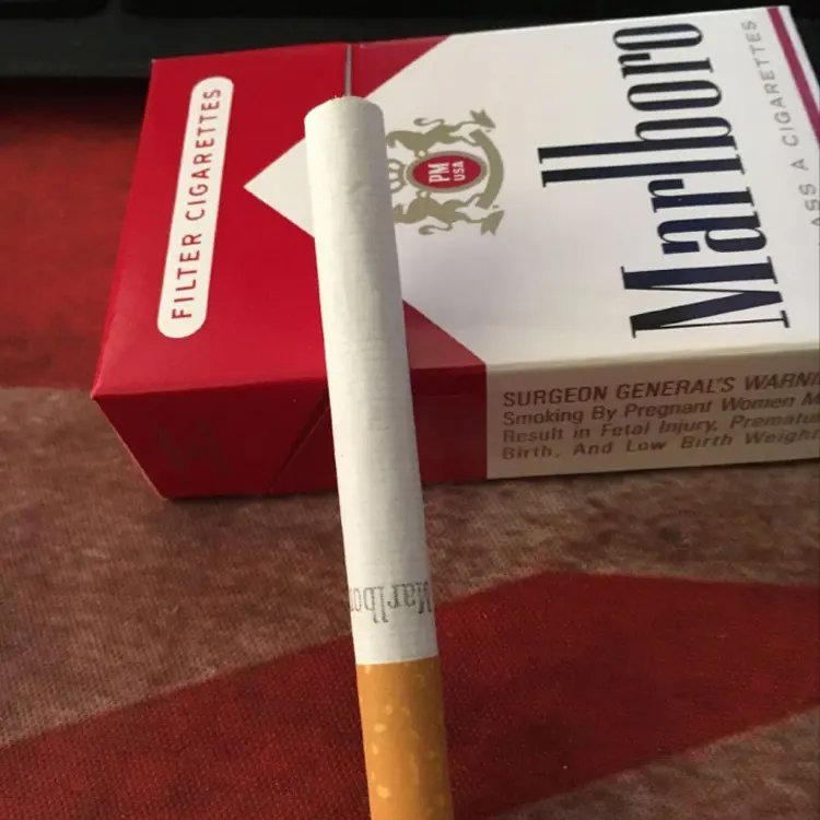 Opened pouch with fresh tobacco close-up
